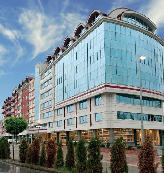 TCC Grand Plaza, a glass-fronted building in Karposh, Skopje